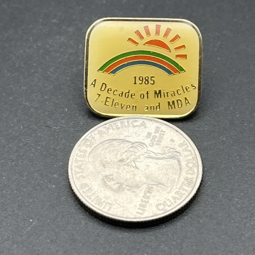 1985 A Decade Of Miracles 7-Eleven And MDA Lapel Hat Pin‎